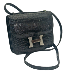 constance size 19 black genuine leather specially designed crocodile texture women's shoulder crossbody bag with super textured metal buckle. the compact and exquisite design meets the women's daily travel, party and weekend date first choice